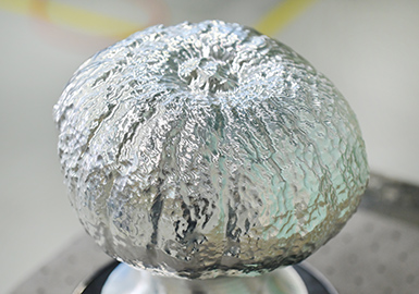 'An aluminum sculpture symbolizing our "pumpkin chopping device." Produced using simultaneous 5-axis machining on the MU-8000V-L for a food machinery exhibition.