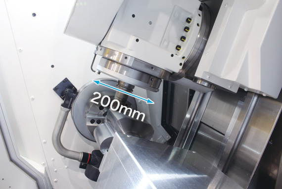 Both high machining capacity and large machining area on a compact machine