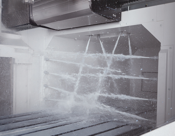Crossrail shower system (Optional) removes chips from the workpiece and table